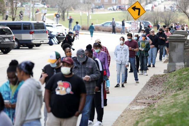 A line of voters outside Riverside University High School in Milwaukee during the Wisconsin primary
