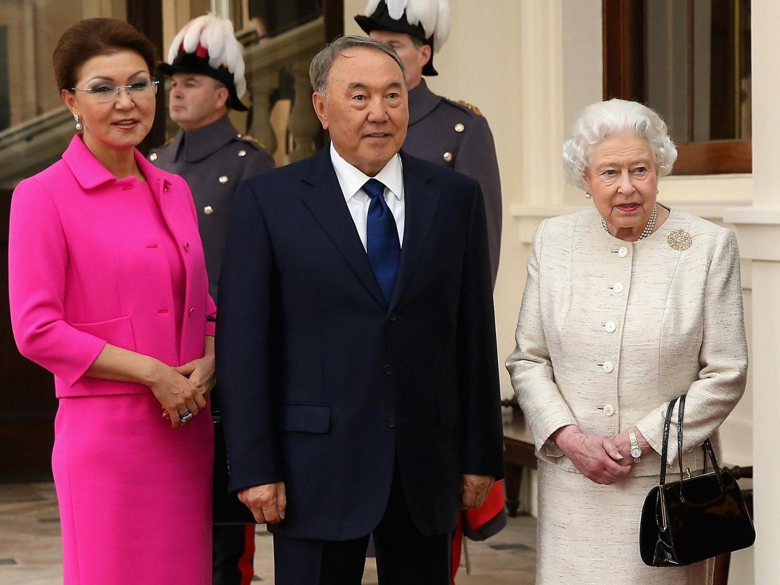 Dariga Nazarbayeva and her father president Nursultan Nazarbayev with Queen Elizabeth at Buckingham Palace in November 2015
