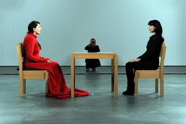 Opening night of The Artist is Present performed by Marina Abramovic (left) 