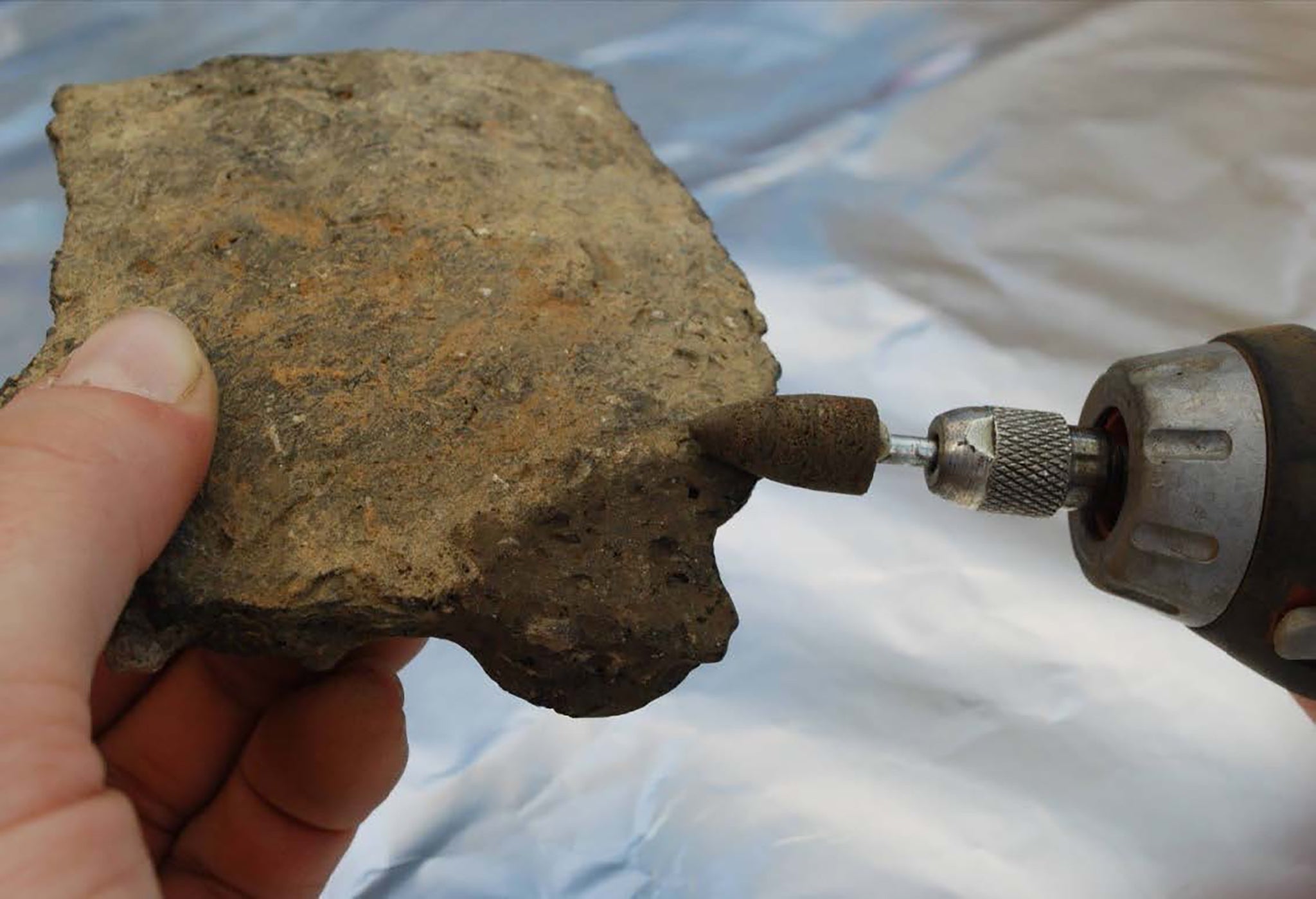 Samples of pottery found at the Shoreditch site being taken for radiocarbon dating