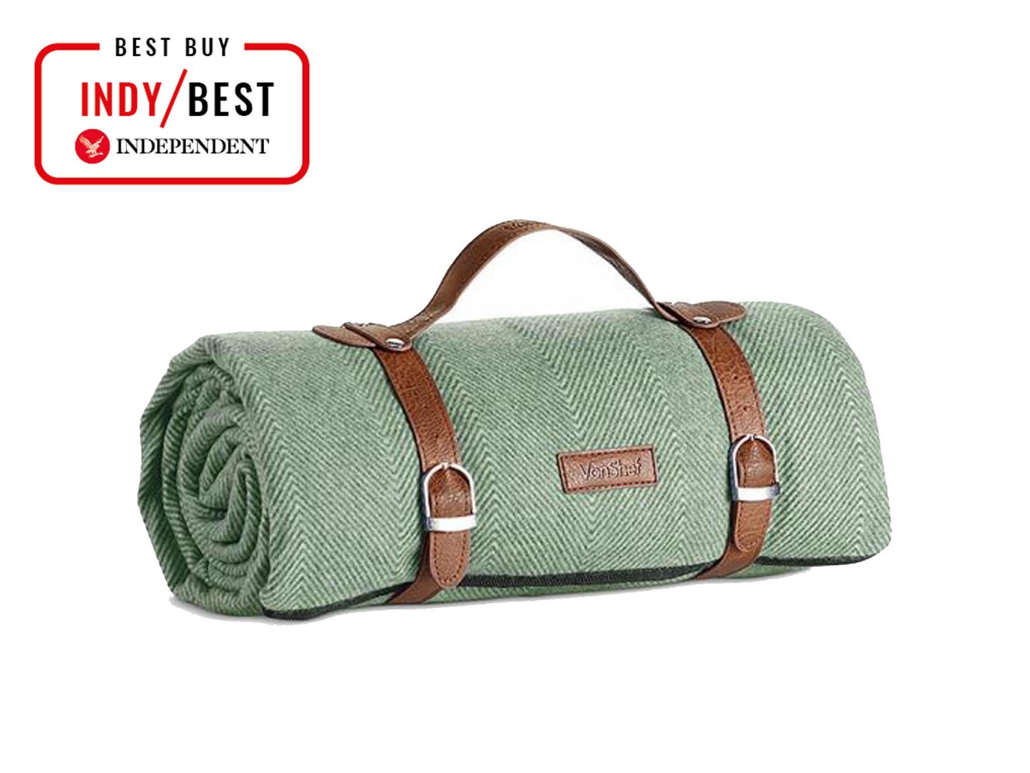 This picnic blanket from Von Shef looks smart and rolls up easily to be secured with dark brown leather-look carry straps (VonShef)