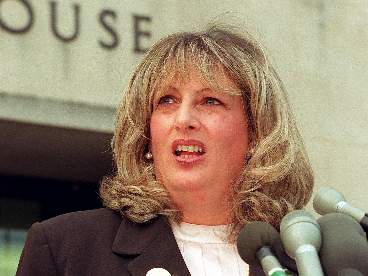 Linda Tripp talks to reporters outside of the Federal Courthouse in Washington DC during the Monica Lewinsky investigation