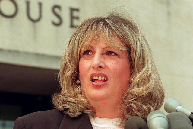 Linda Tripp talks to reporters outside of the Federal Courthouse in Washington DC during the Monica Lewinsky investigation