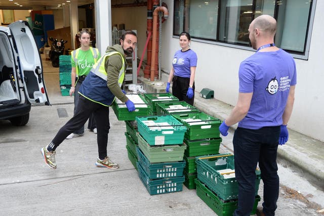 Helping hand: proprietor of The Independent Evgeny Lebedev delivers 600 meals to Great Ormond Street staff with other Felix volunteers