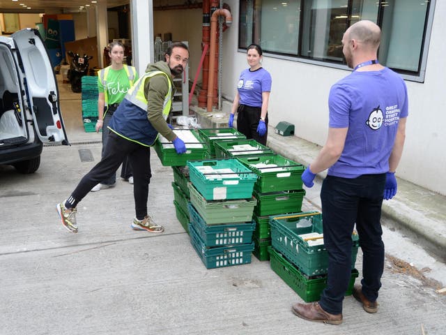 Helping hand: proprietor of The Independent Evgeny Lebedev delivers 600 meals to Great Ormond Street staff with other Felix volunteers