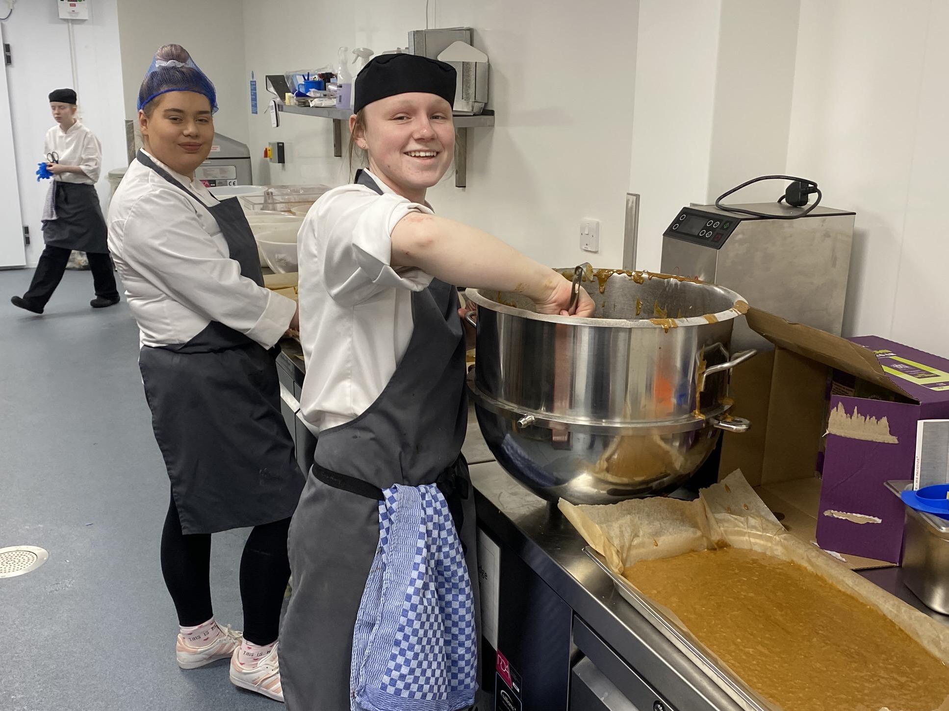 Staff and volunteers at The Auckland Project’s kitchen