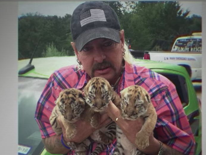 Tiger King star Joe Exotic â€˜refuses to accept defeatâ€™ after losing zoo to rival Carole Baskin - The Independent
