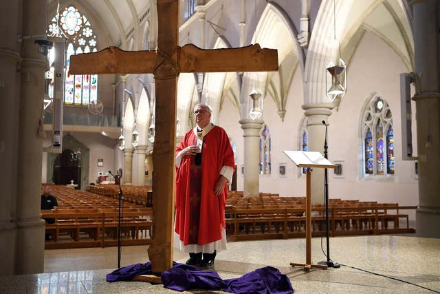 Catholic archbishop Mark Coleridge at an empty St Stephen's cathedral in Brisbane, Australia, on Good Friday
