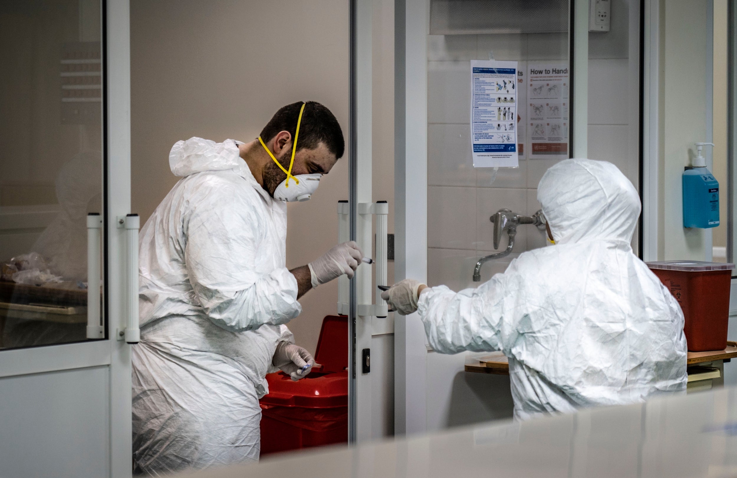 Doctors in the ICU of the coronavirus section of the hospital