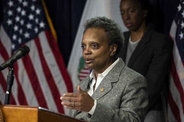 Lori Lightfoot speaking at a press conference in Chicago