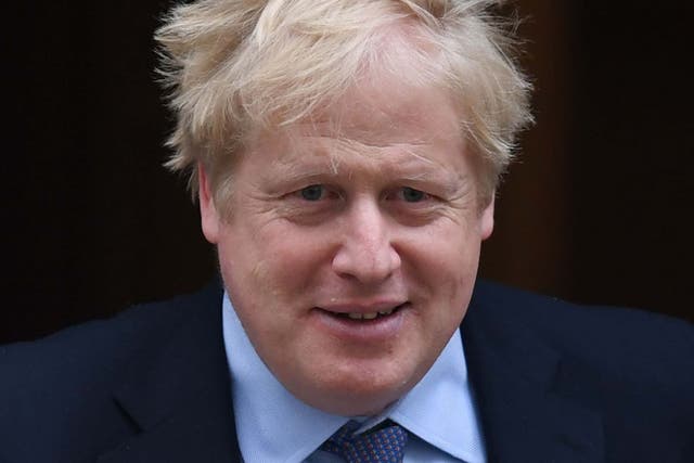 In this file photo, Boris Johnson leaves 10 Downing Street in central London, to take part in PMQs at the House of Commons