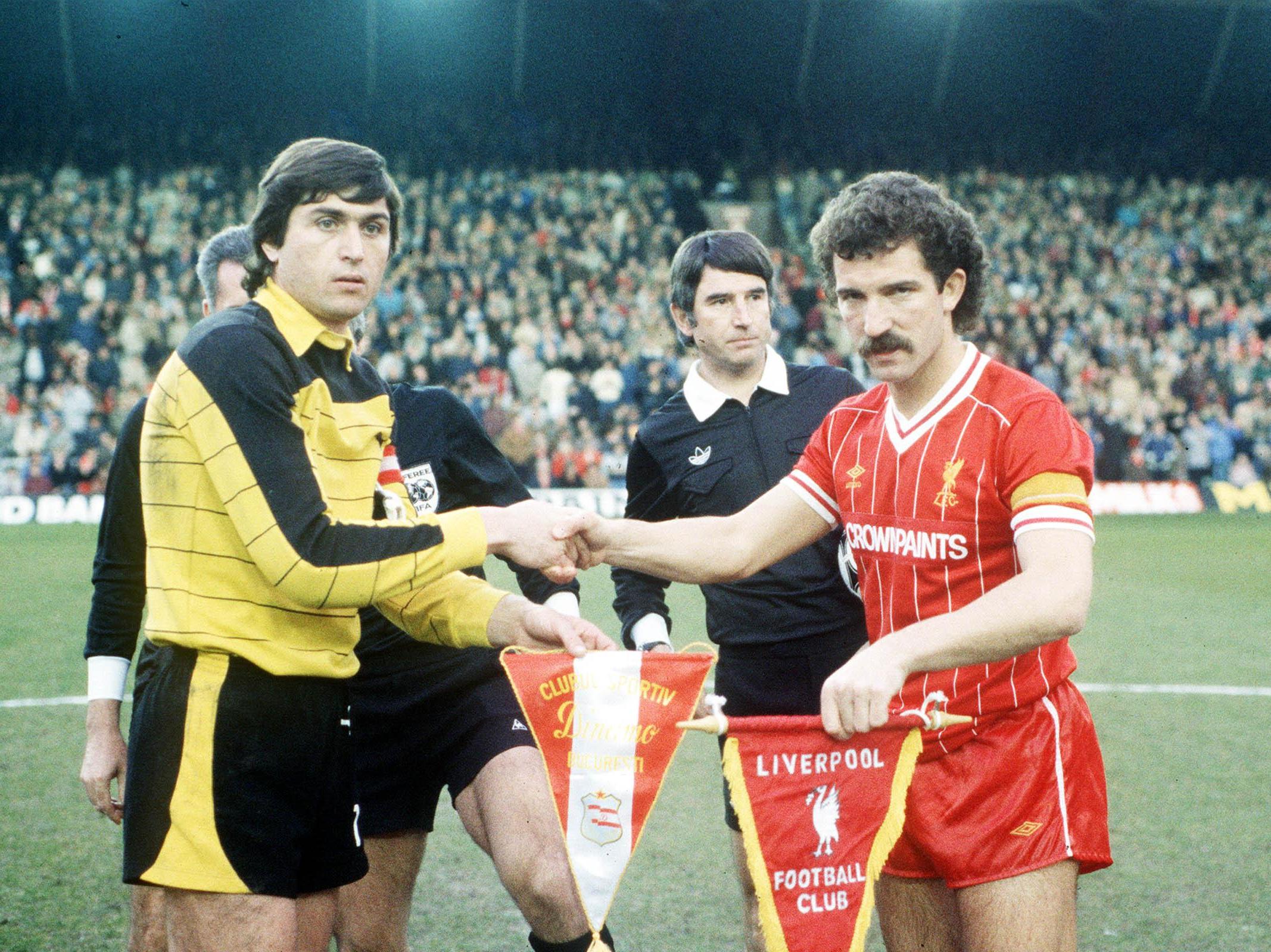 Graeme Souness, right, shakes hands with Dumitru Moraru at Anfield