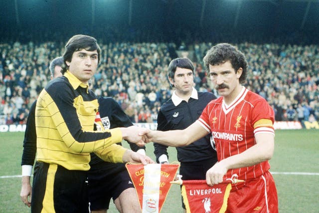 Graeme Souness, right, shakes hands with Dumitru Moraru at Anfield