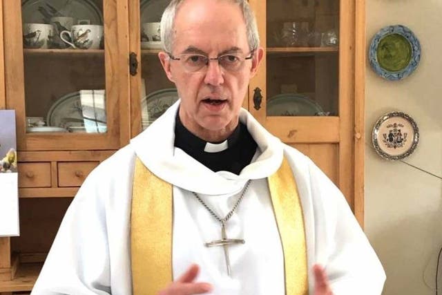 The Archbishop of Canterbury Justin Welby recording his Easter Sunday sermon in the kitchen of his flat at Lambeth Palace in London.