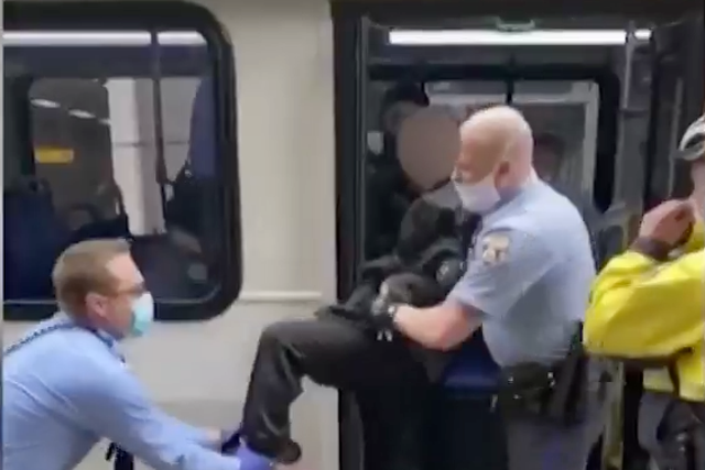Philadelphia police officers drag a passenger from a bus for not wearing a face mask. The local transit authority is changing its enforcement policy after the incident