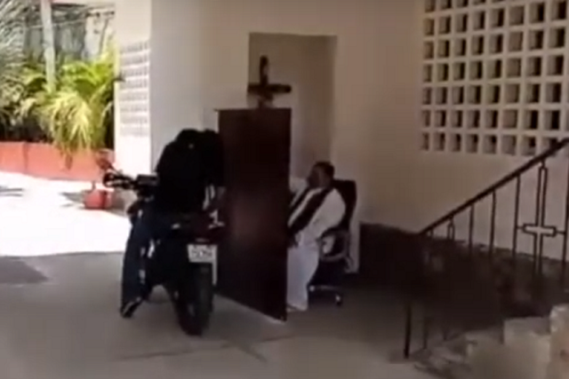 Screen grab from video of priest hearing confessions at a makeshift drive-through confessional in Acapulco, southern Mexico, ahead of Easter during the coronavirus pandemic, 9 April 2020.