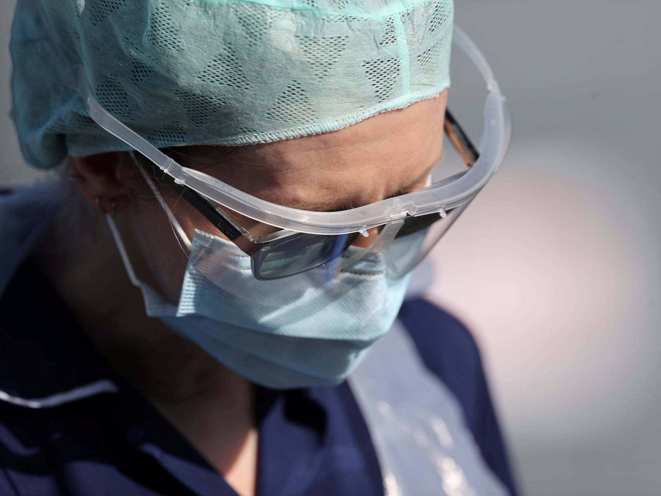 A member of medical staff is seen at an NHS coronavirus disease testing facility