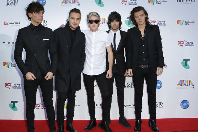 Louis Tomlinson, Liam Payne, Niall Horan, Zayn Malik and Harry Styles on 26 November 2014 in Sydney, Australia.