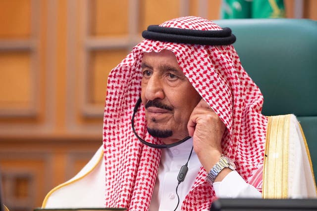 A handout photo made available by the Saudi Royal Court shows Saudi King Salman bin Abdulaziz on 26 March, 2020.