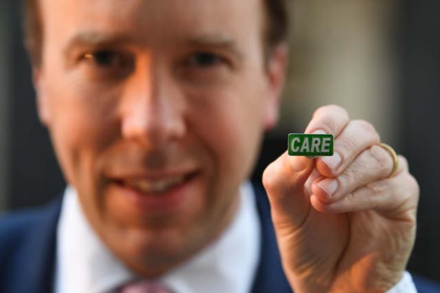 Matt Hancock with a ‘badge of honour’ for social care workers so they can get the same public recognition as NHS staff