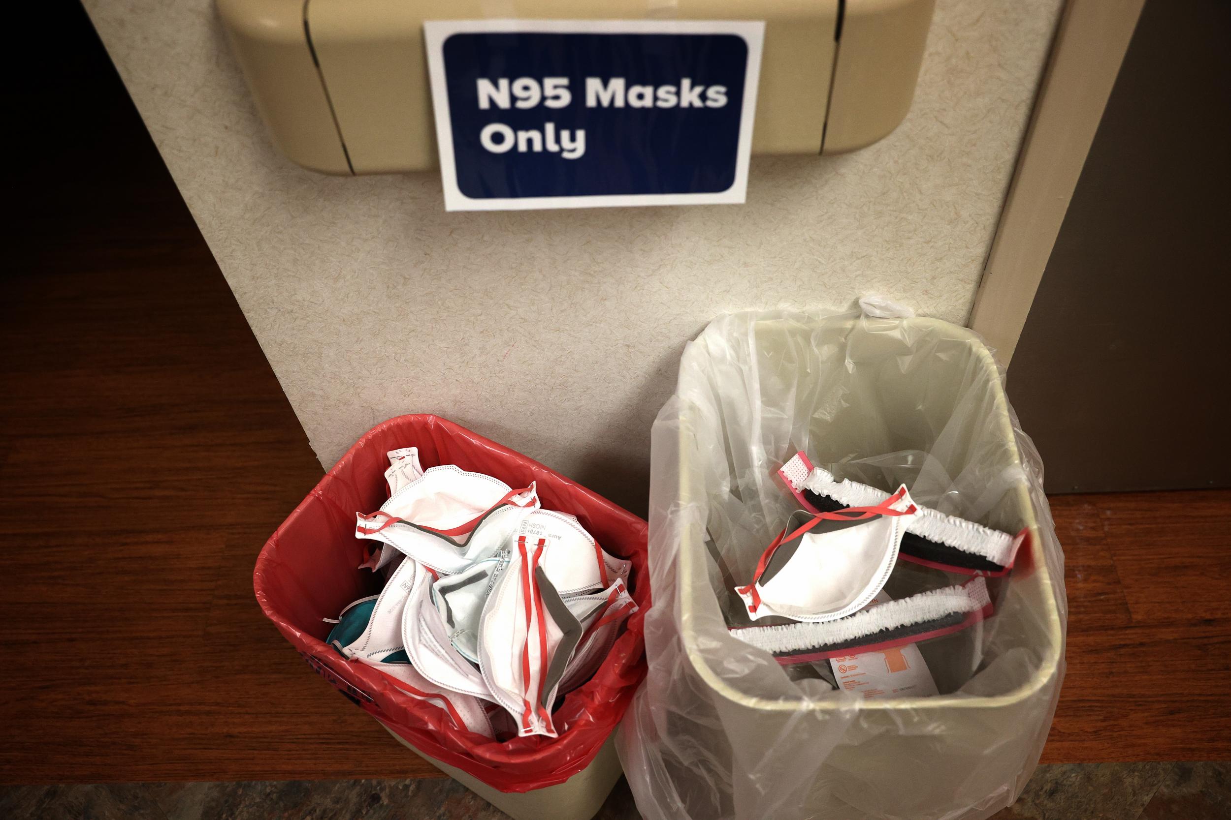 Previously worn N95 protective masks, saved for possible recycling in the future, sit in baskets in the Intensive Care Unit of MedStar St Mary’s Hospital in Maryland