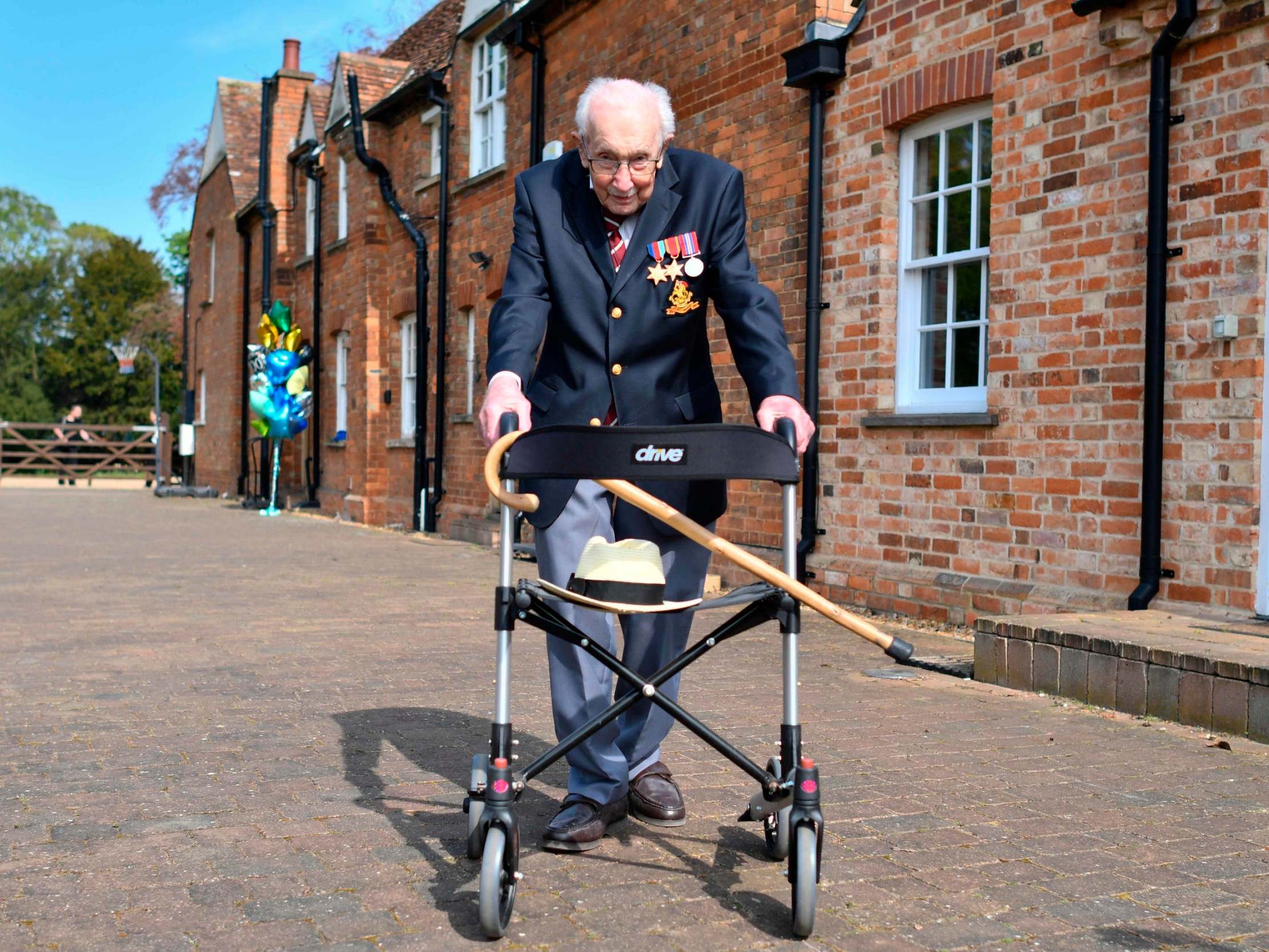 Captain Tom Moore completes 100th lap of his garden to raise millions for NHS Charities Together