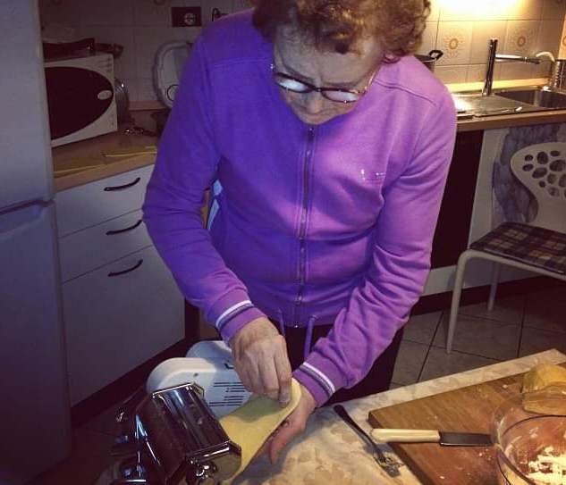 Rosa Fretti making lasagne (Federica Marsi/The Independent)