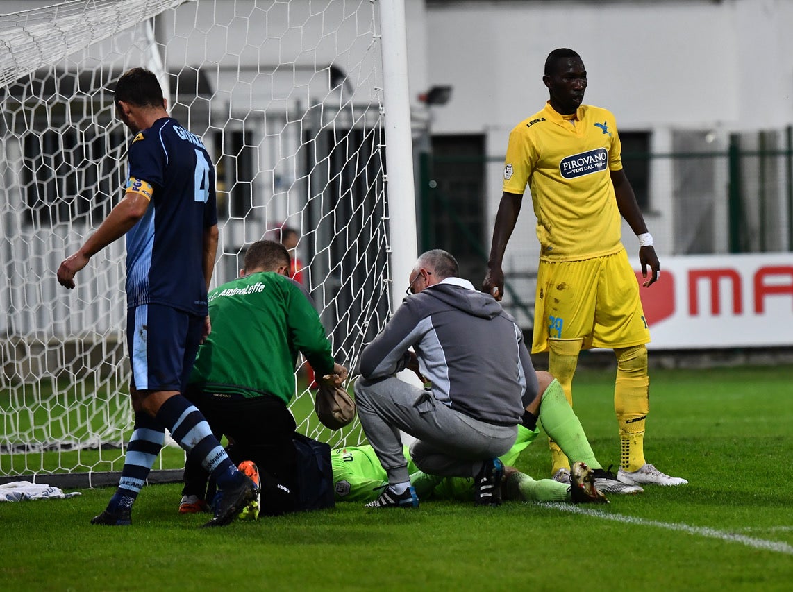 Ivano Riva (in grey) treating one of AlbinoLeffe's players