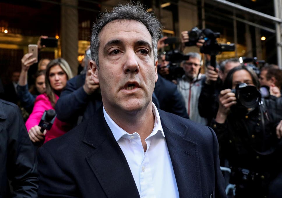 Michael Cohen leaving his apartment to report to prison