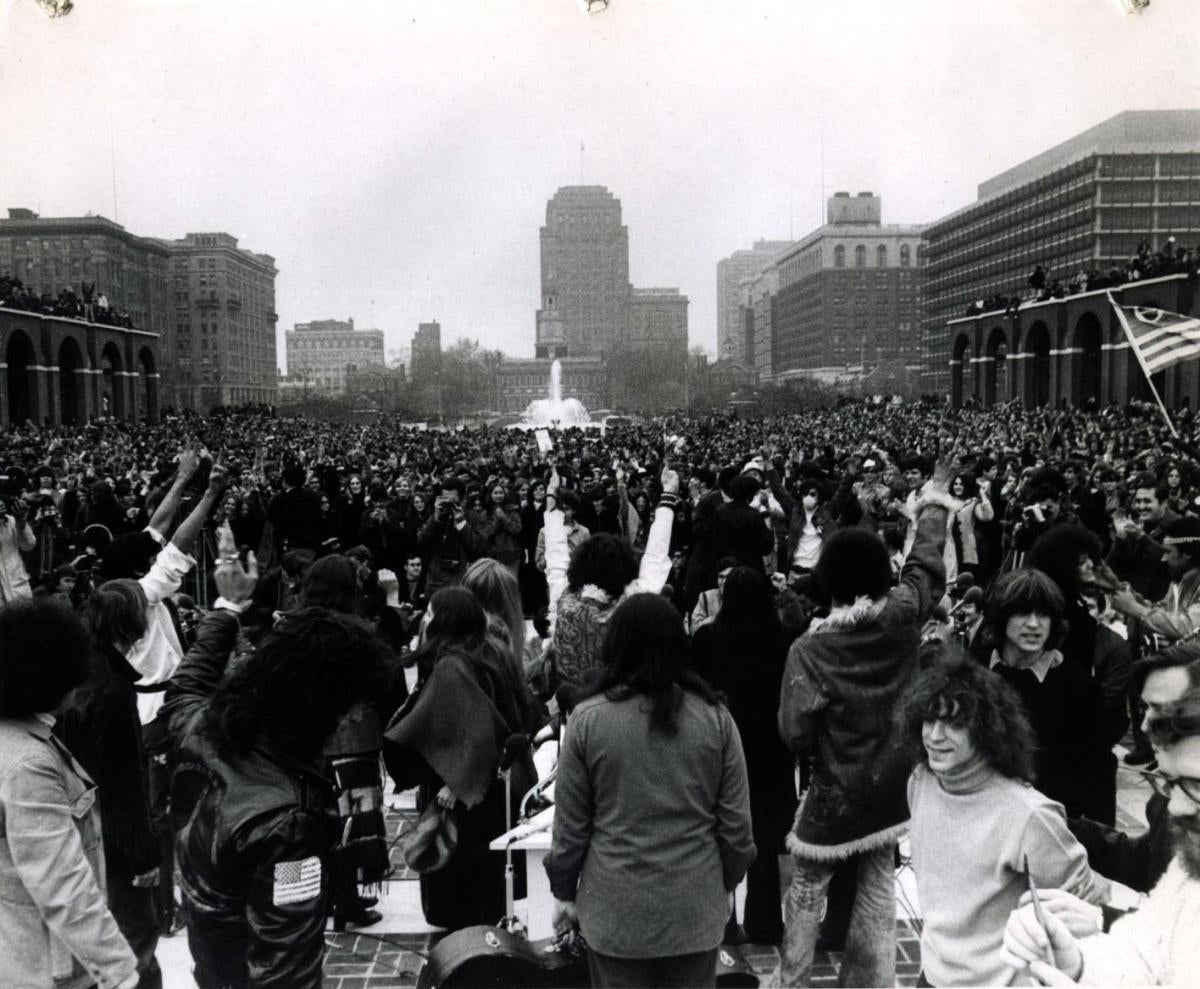 The audience listen to 'Hair' performing on the eve of Earth Day to 20,000 in a public mall across from Independence Hall in Philadelphia