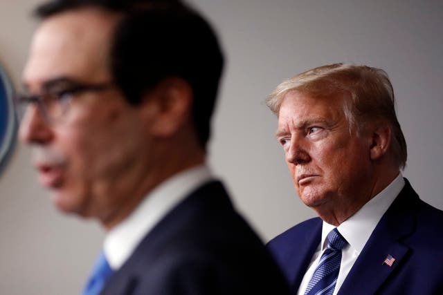 Treasury Secretary Steven Mnuchin, left, and Donald Trump have said they will get stimulus money back that erroneously went to dead people. (Photo by AP)