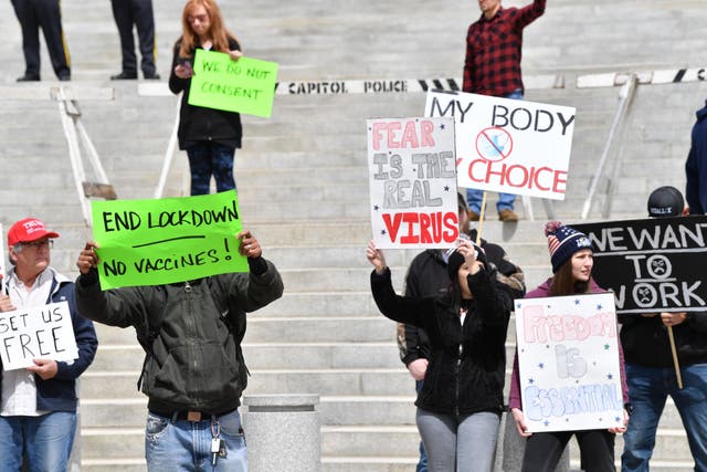People take part in a 'reopen Pennsylvania' demonstration in Harrisburg, Pennsylvania on Monday
