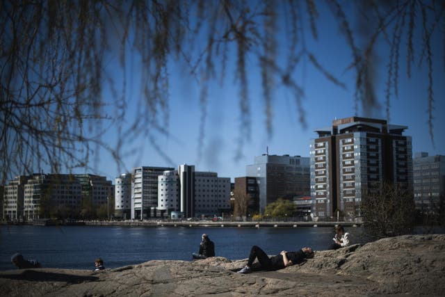 People have been enjoying the spring sun in Sodermalm, Stockholm despite coronavirus regulations