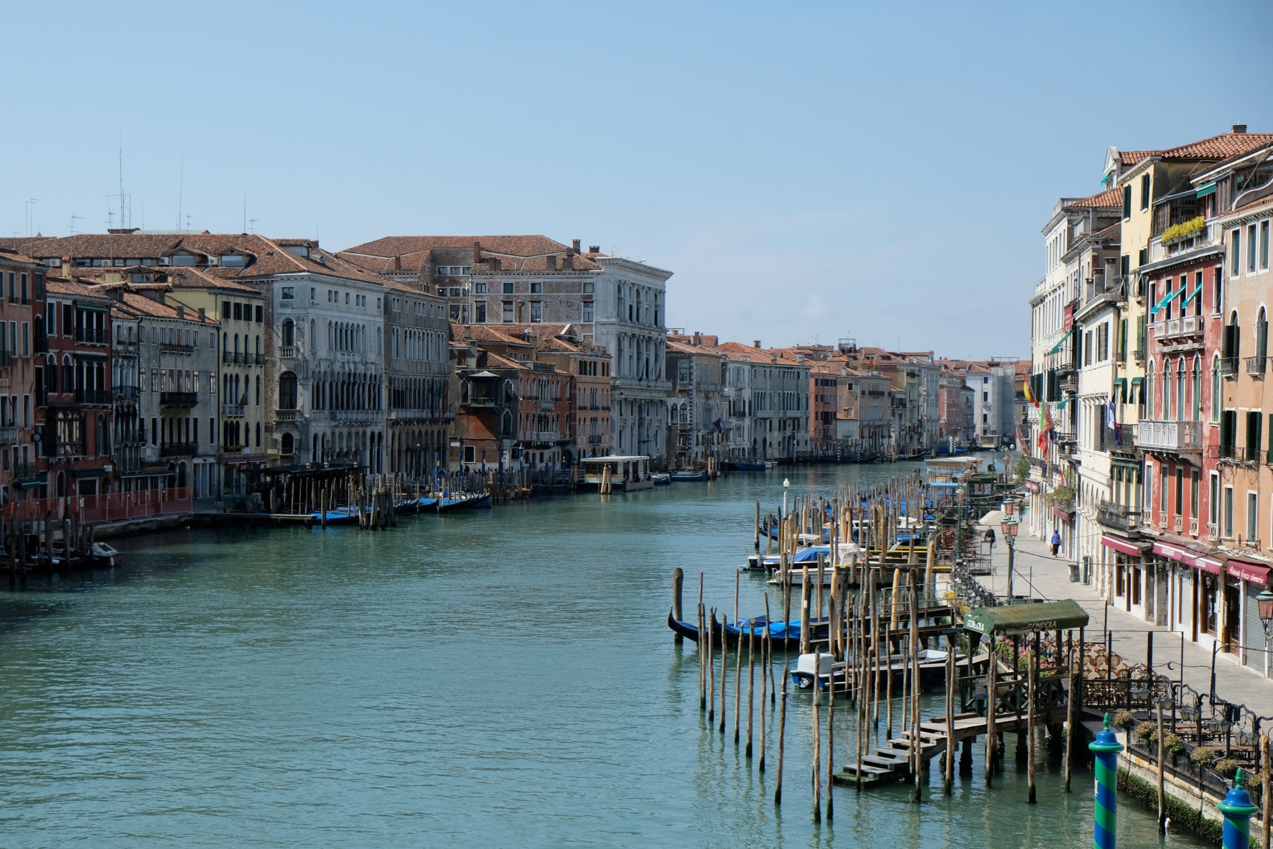 A general view of Grand Canal, which is almost deserted, seen from the Rialto Bridge, during Italy's coronavirus lockdown