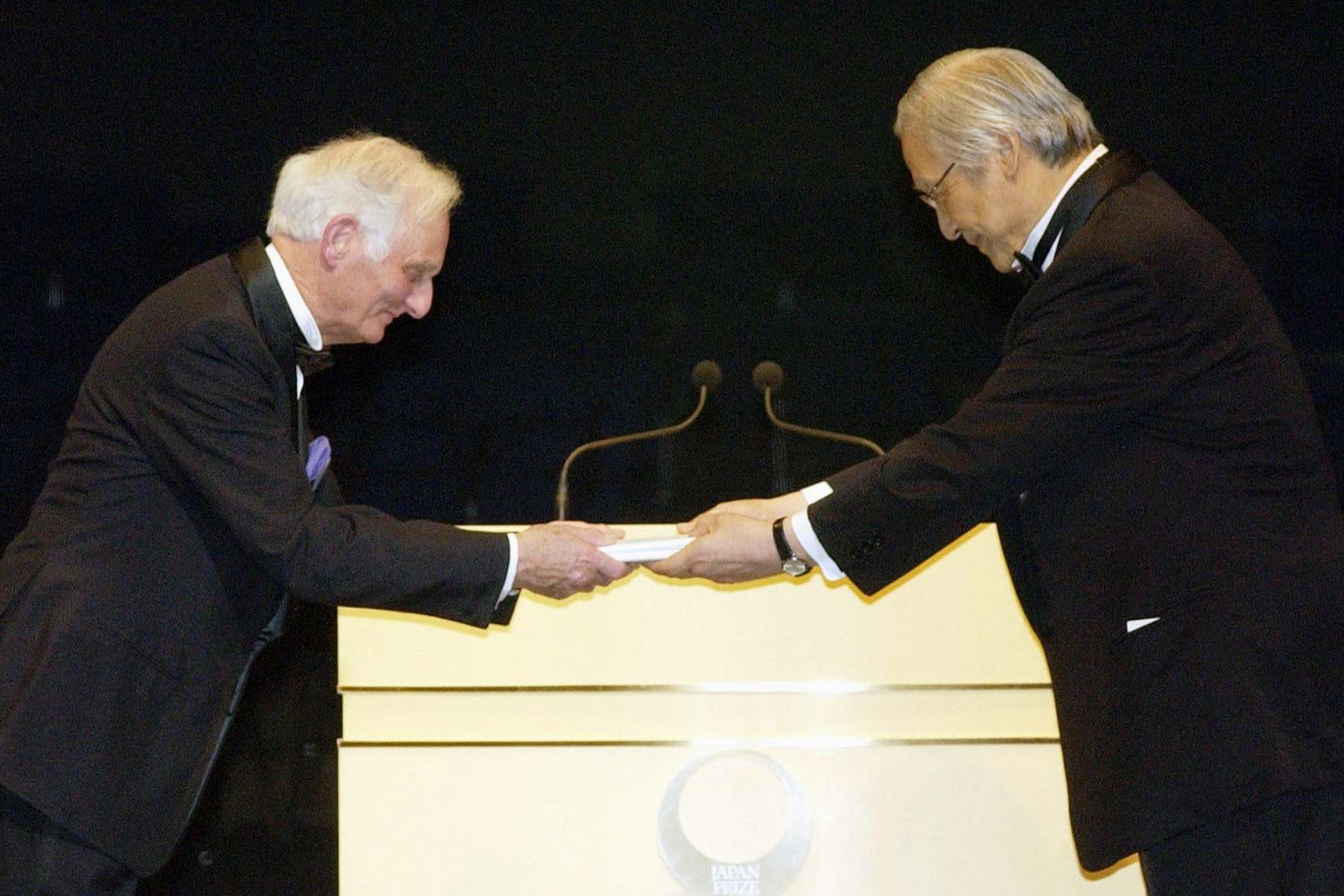 Sir John Houghton (left) collecting the Japan Prize in 2006