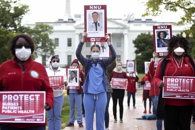Members of the National Nurses Union protesting in front of the White House