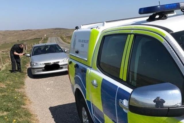 Police have fined a couple caught camping in the Moorlands