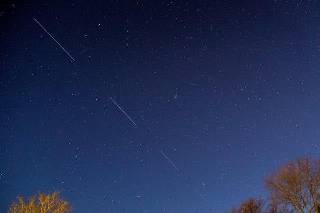 SpaceX Starlink satellites are pictured in the sky seen from Svendborg on South Funen, Denmark 21 April, 2020
