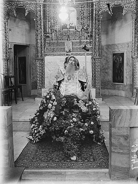 Like many other religious practitioners around the world, some Byzantine and medieval bishops were laid to rest in a seated position. In some places, the tradition continued into relatively modern times. This image shows a mid-20th century Syrian bishop sitting, rather than lying, in state
