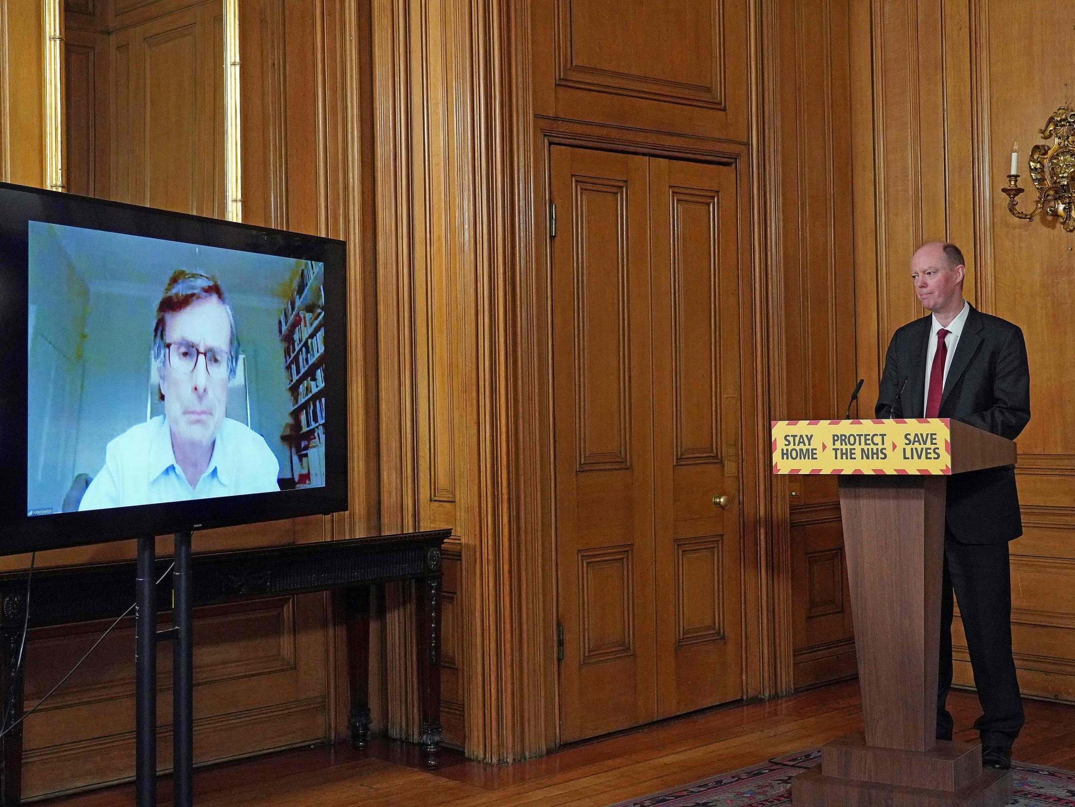 Chris Whitty, the chief medical officer, takes a question by video call from ITV’s Robert Peston during the daily press conference