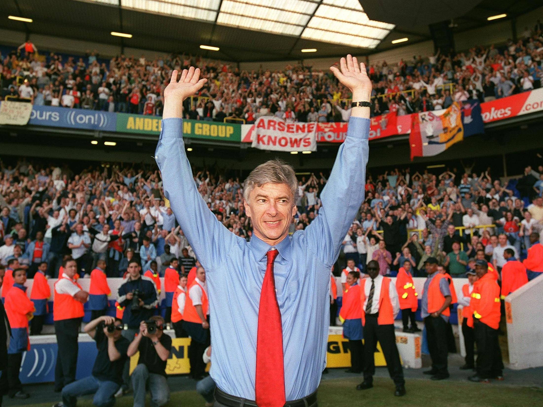 Arsene Wenger celebrates winning the league at White Hart Lane in 2004