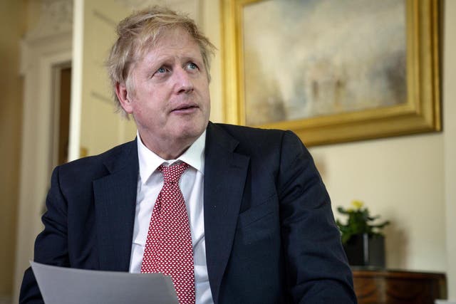 Johnson records a video message at No 10 on Easter Sunday after being released from hospital, before leaving for Chequers