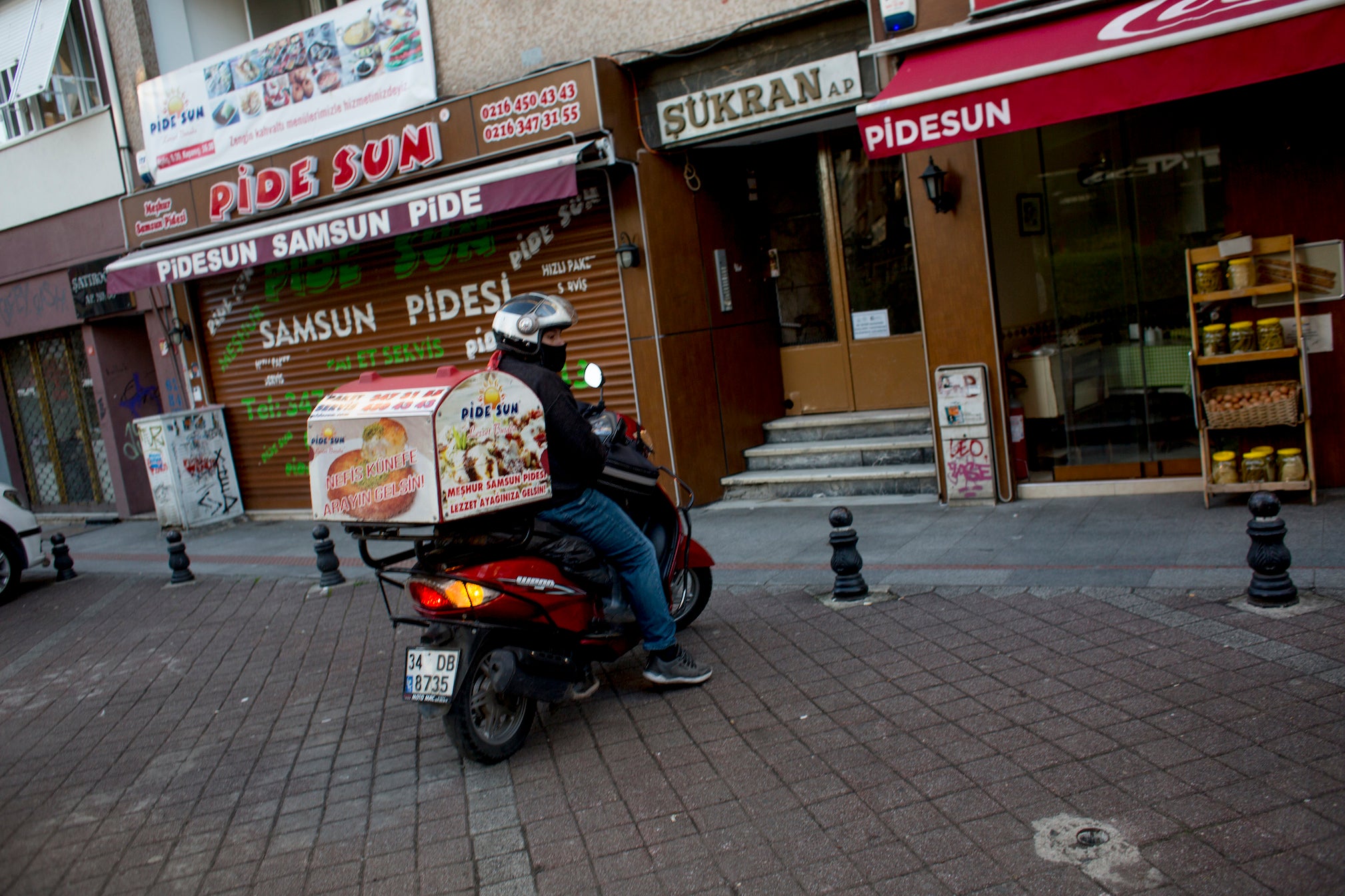 Ferit Buyuk delivers Turkish-style pizzas called pide for a popular restaurant in Istanbul