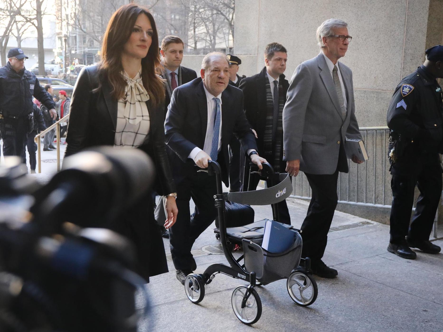 Harvey Weinstein staggers into a New York courtroom in February, accompanied by his lawyer, Donna Rotunno (left) (Spencer Platt/Getty)