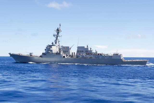 Official U.S. Navy file photo of the Arleigh Burke-class guided-missile destroyer USS Kidd (DDG 100) transiting the Pacific Ocean.