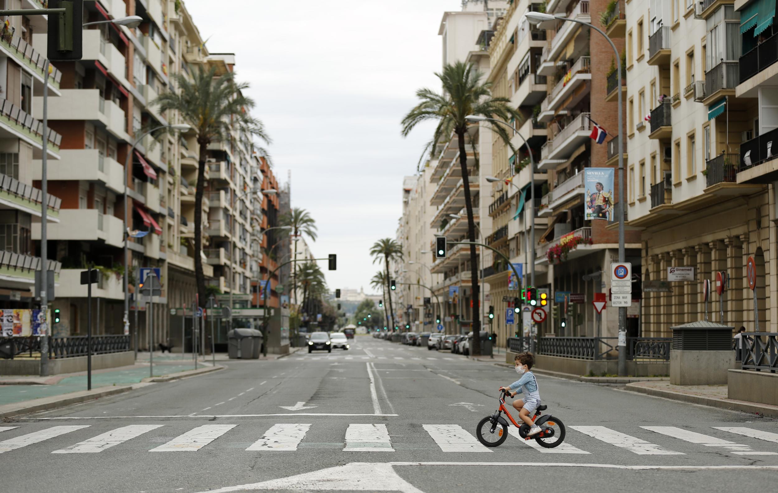 Some countries, like Spain (pictured), have eased restrictions, letting children play outside