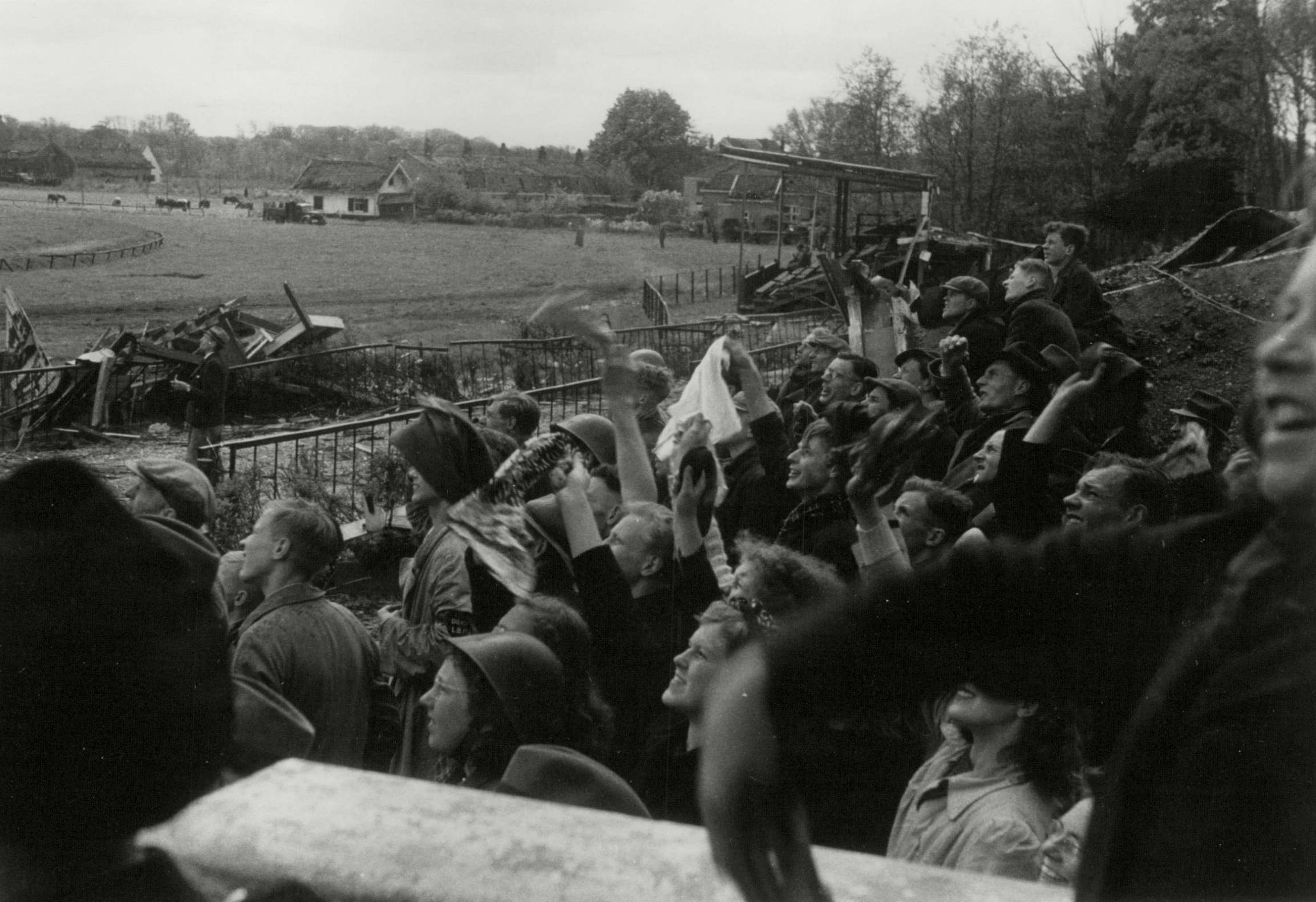 Dutch people wait for a food drop in 1945: tens of thousands nearly died from starvation during the Hungry Winter