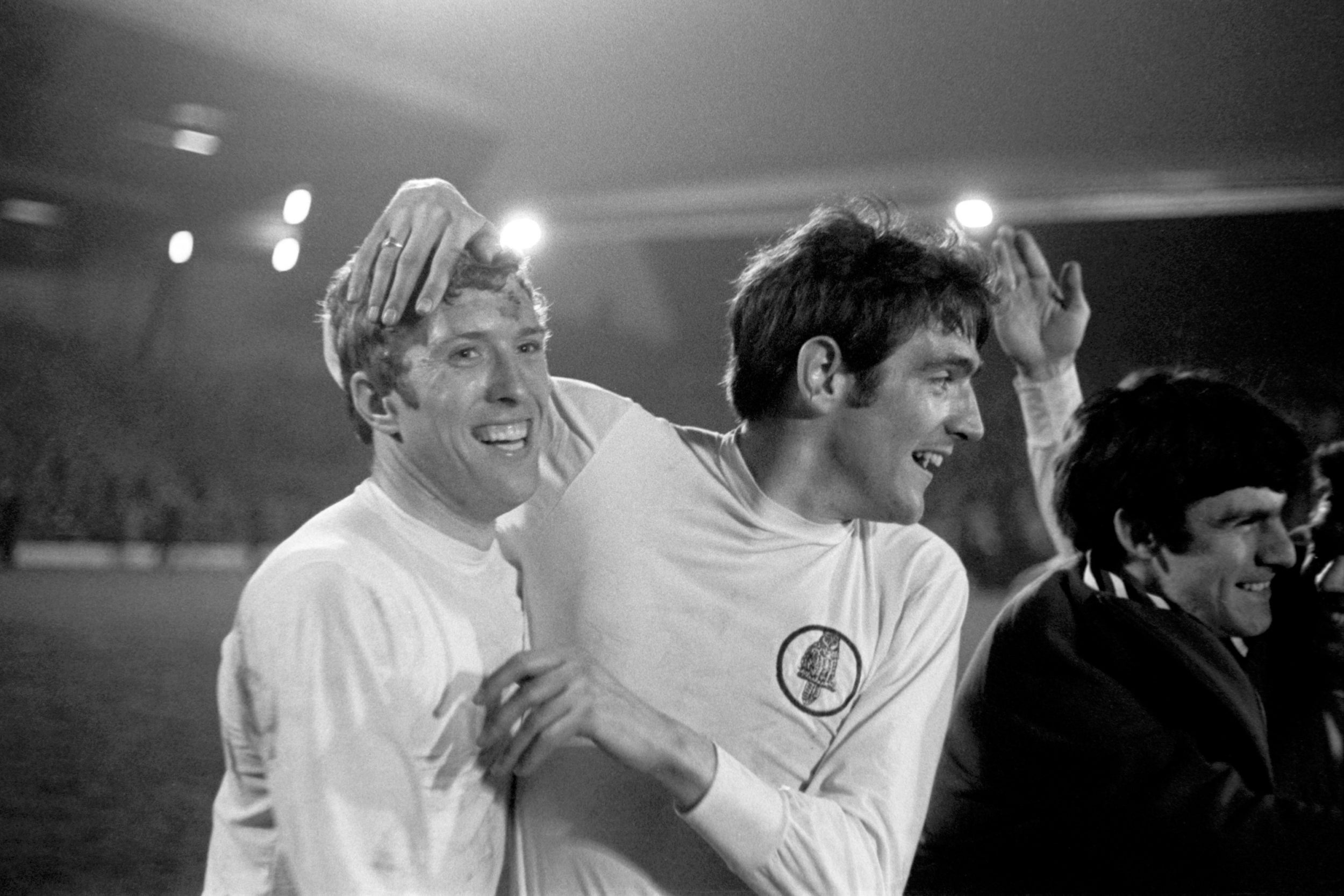 Norman Hunter (right) celebrates with Mick Jones as Leeds United win the First Division title in 1969