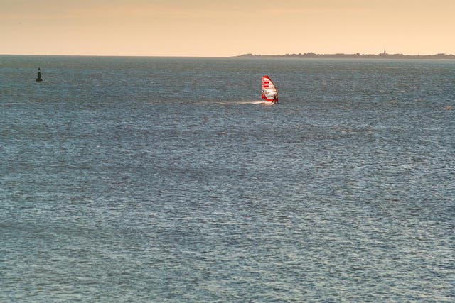 A windsurfer at sea in La Rochelle