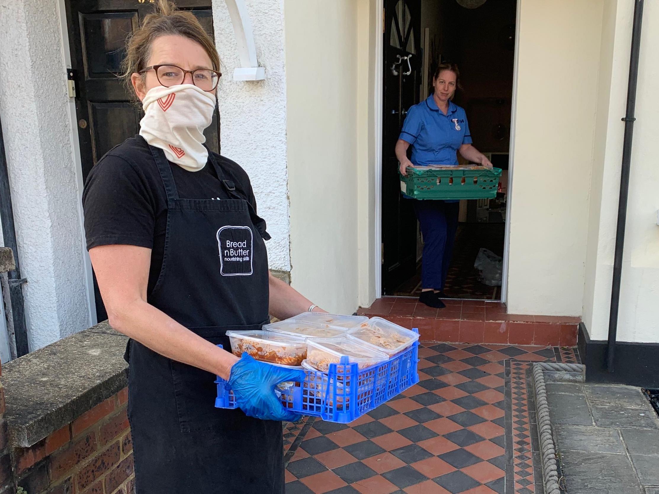 Vicki Williams, co-founder of the BreadnButter project, dropping off food with NHS nurse Kim Pallas